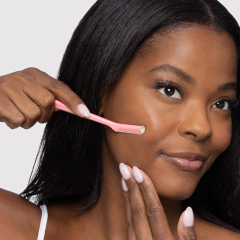 Model using Tea Rose Metal Facial Razor on side of the face