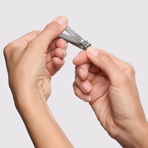 Model using Disney's Ear-esistible Fingernail Clipper