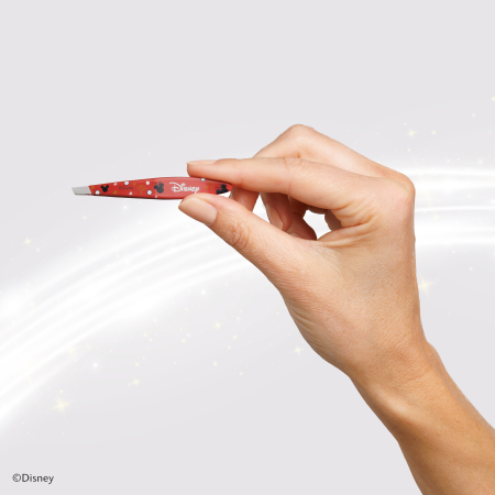 Model holding Disney's Mickey Mouse &amp; Minnie Mouse Magic All Around Mini Slant Tweezer