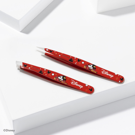 Disney's Mickey Mouse &amp; Minnie Mouse Magic All Around Petite Tweeze Set placed on a white block tray