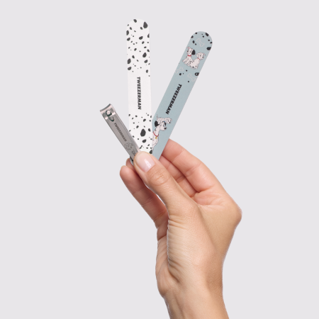 Model holding Disney's 101 Dalmatians Manicure Kit