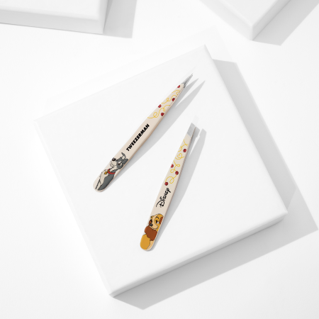 Disney's Lady and the Tramp Petite Tweezer Set placed on a white block tray