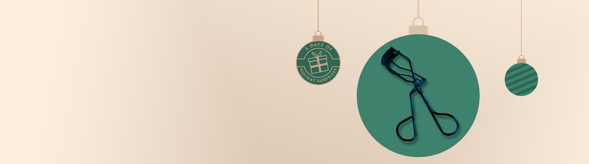 Navy classic eyelash curler, Green and gold holiday ornaments