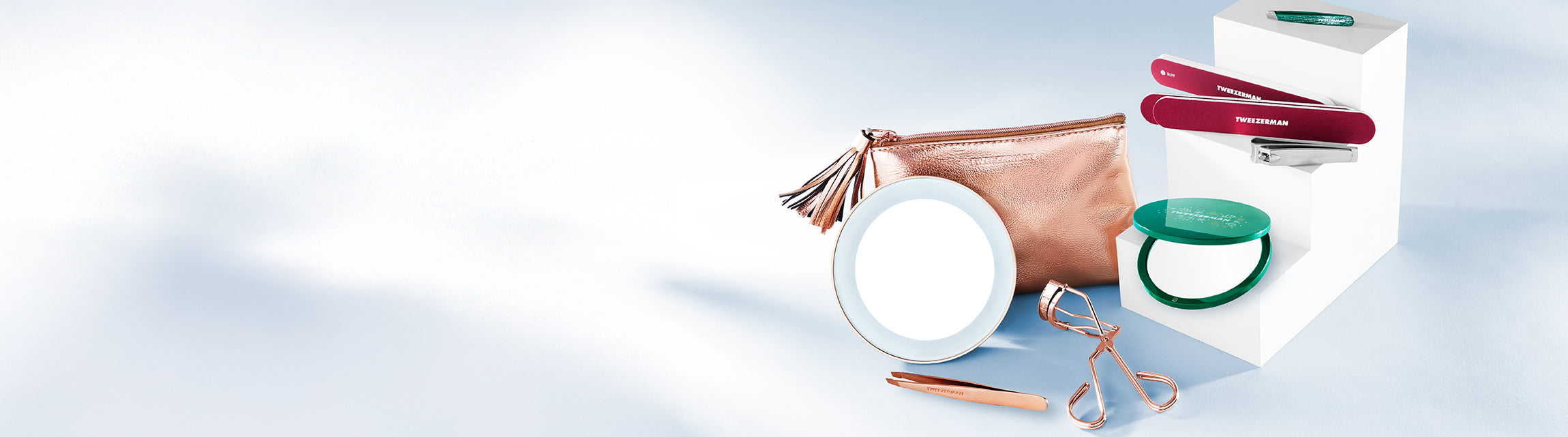 MICRO MINI SLANT TWEEZER EMERALD GREEN. Merry Berry Manicure Set with nail file and combo clipper or Enchanted Garden Compact Mirror.  GIFT BOX SET ROSE GOLD with mirror, rose gold slant tweezer and eyelash curler.
