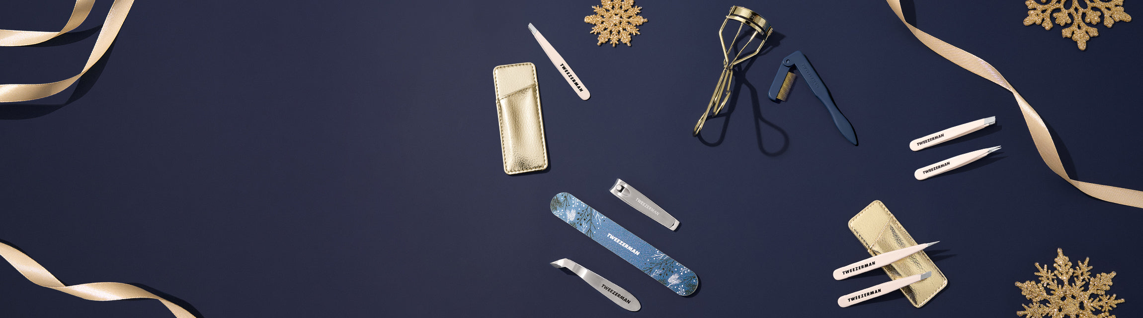 Tweezerman Holiday Collection Evening Glow, designed in rich, evening-inspired hues, this collection features precision tools in festive blue and gold, making it a thoughtful gift for any beauty lover or a perfect addition to your holiday beauty routine. Evening Glow Lash Gift Set
	Evening Glow Manicure Gift Set
Evening Glow Mini Tweezer Set
Evening Glow Mini Slant Tweezer with Case
Evening Glow Micro Mini Tweezer Set