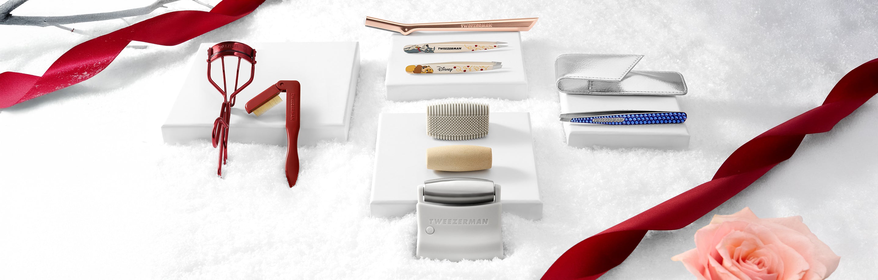SNOW AND RED RIBBON BACKDROP, VINTAGE ROSE CURLER SET, ROSE GOLD FACIAL RAZOR, LADY IN THE TRAMP TWEEZER SET, 3-IN-1 FACIAL ROLLER, SWARVOSKI CRYSTAL SLANT  TWEEZER WITH METALLIC CASE