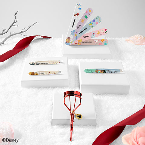 DISNEY COLLECTIONS: LADY IN THE TRAMP TWEEZER SIT WITH SLANT AND POINT, DISNEY PRINCESS FRIENDS SET OF 5 NAIL FILES, JASMINE SLANT TWEEZER, DISNEY MICKEY AND MINNIE MOUSE RED EYELASH CURLER WITH GOLD DISNEY LOGO CHARM.