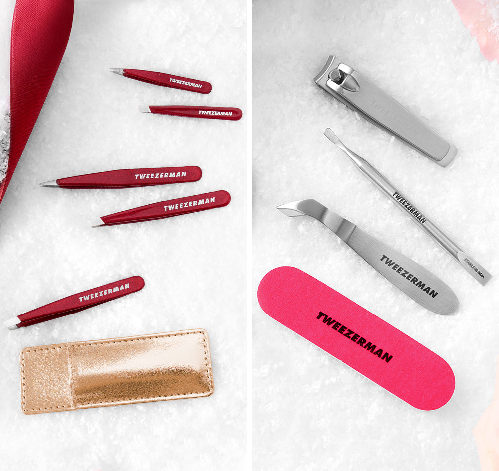 White snow and ribbon backdrop featuring Vintage Rose Tweezer sets with gold case, mini neon manicure kit with pink mini nail file, and stainless steel cuticle nipper, push, and nail clipper.