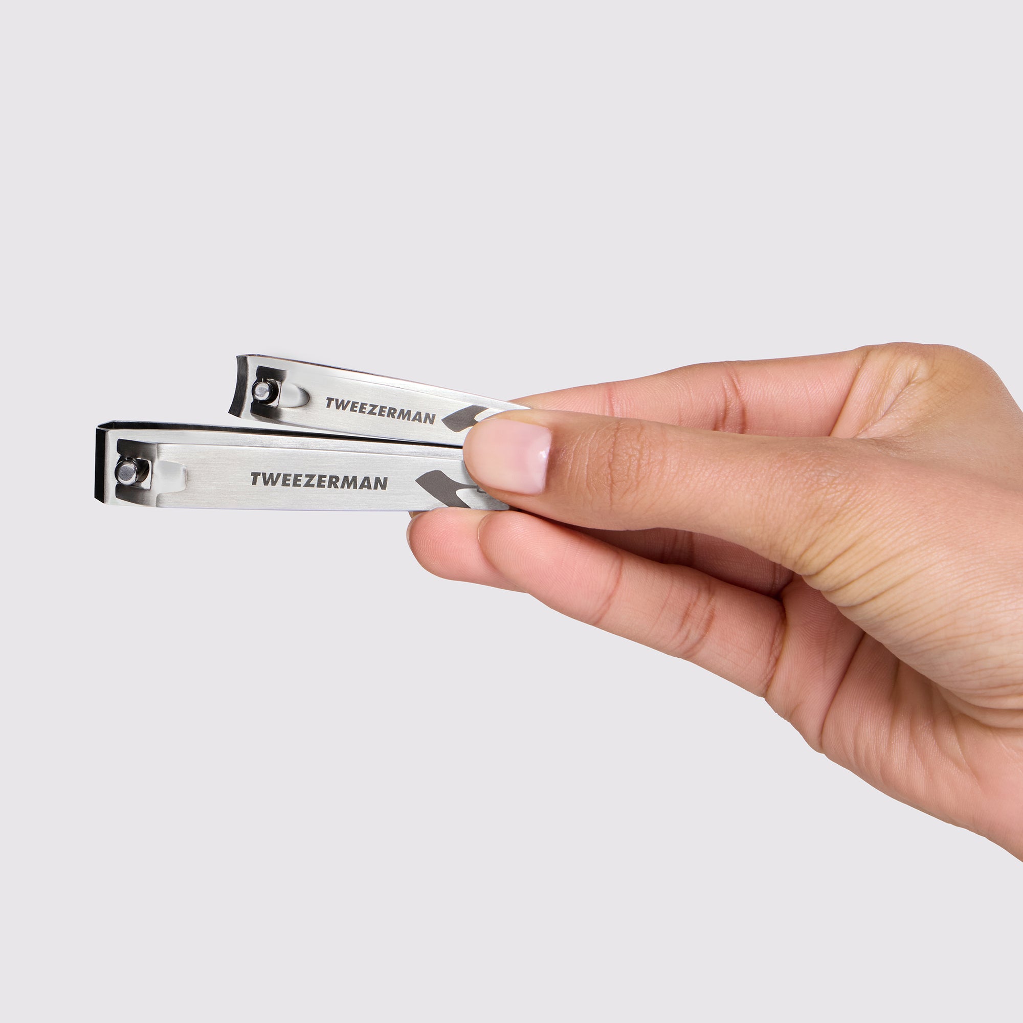 Model holding The Devil Wears Prada 2 Combo Clipper Set