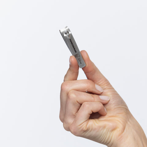 Model holding Disney's Happily Fingernail Clipper