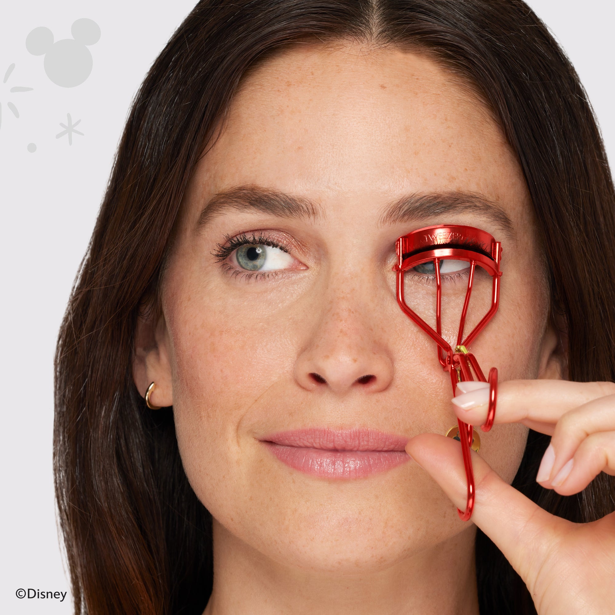 Model Using Red Minnie Mouse Eyelash Curler hover_image