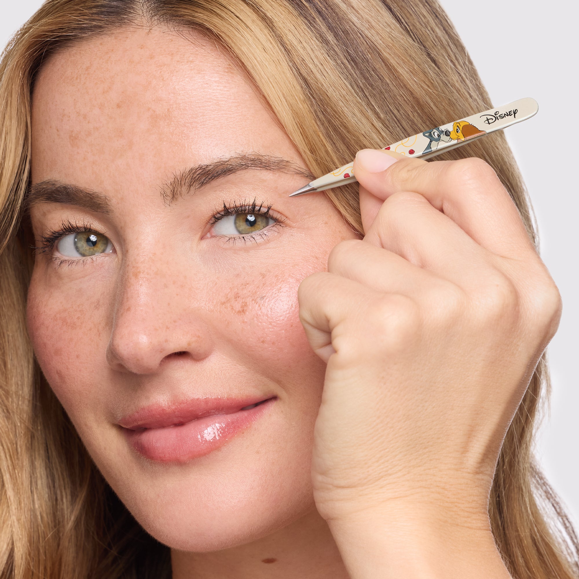 Model using Disney&#39;s Lady and the Tramp Petite Point Tweezer