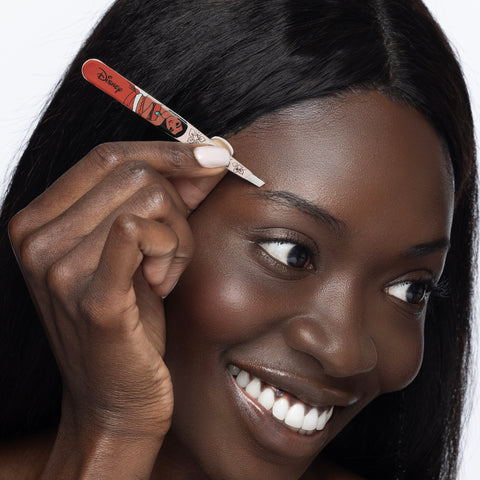 Model using Disney's Moana Slant Tweezer