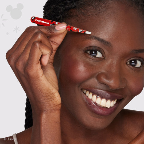 Model using Red Mickey Mouse and Minnie Mouse slant tweezer with red bow and white hands