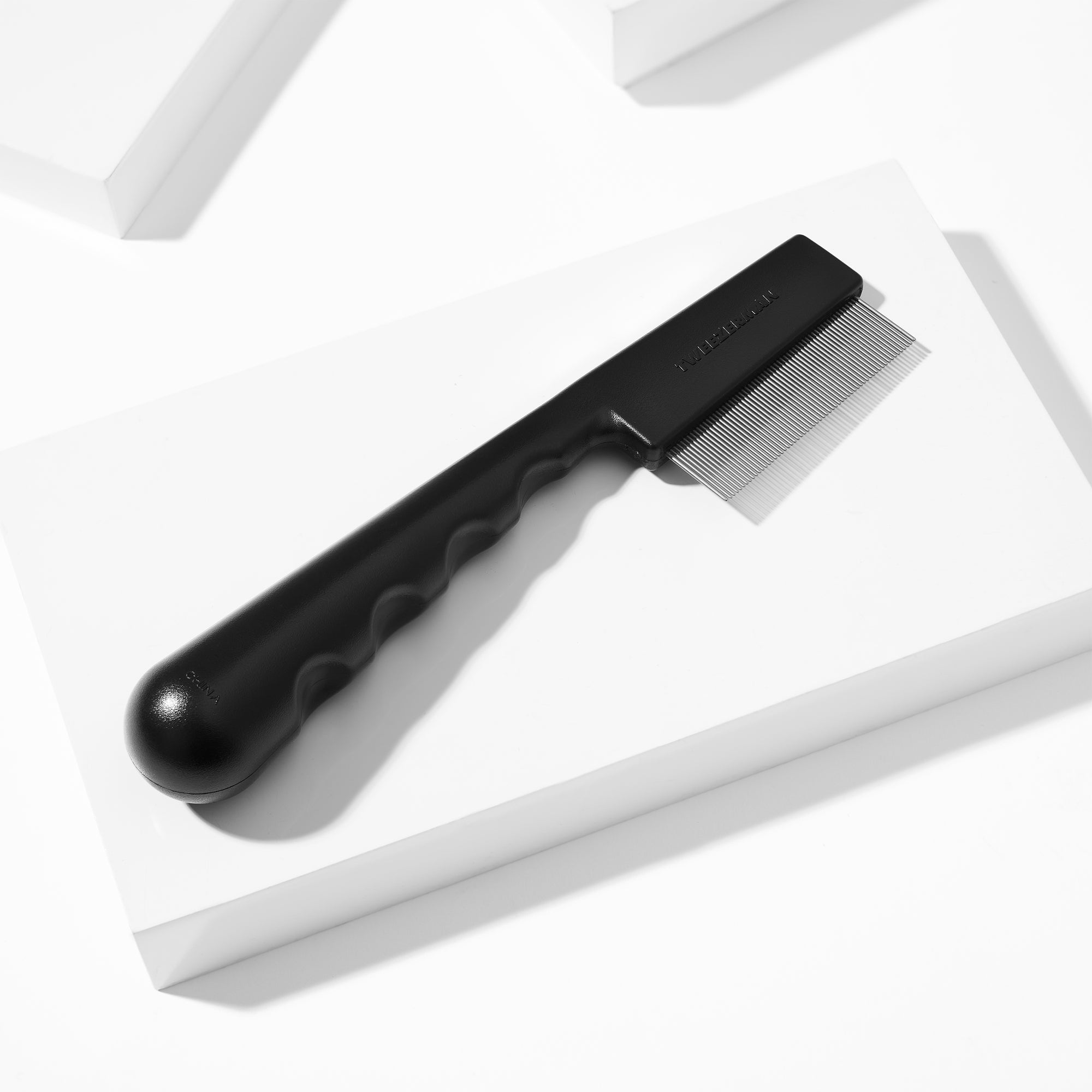 Pet Precision Single Row Flea Comb displayed on a white block tray background