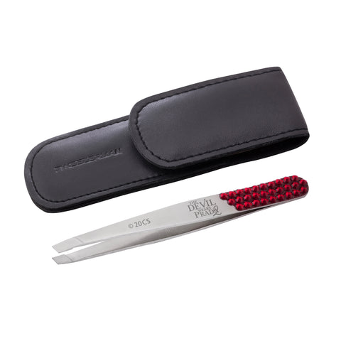 The Devil Wears Prada 2 Crystal Slant Tweezer placed next to its case