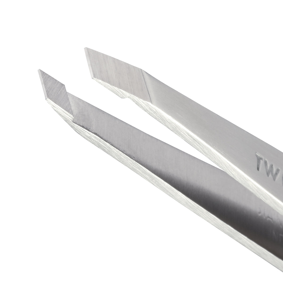 Close-up of the slanted stainless-steel tips on the Tweezerman Classic Slant Tweezer
