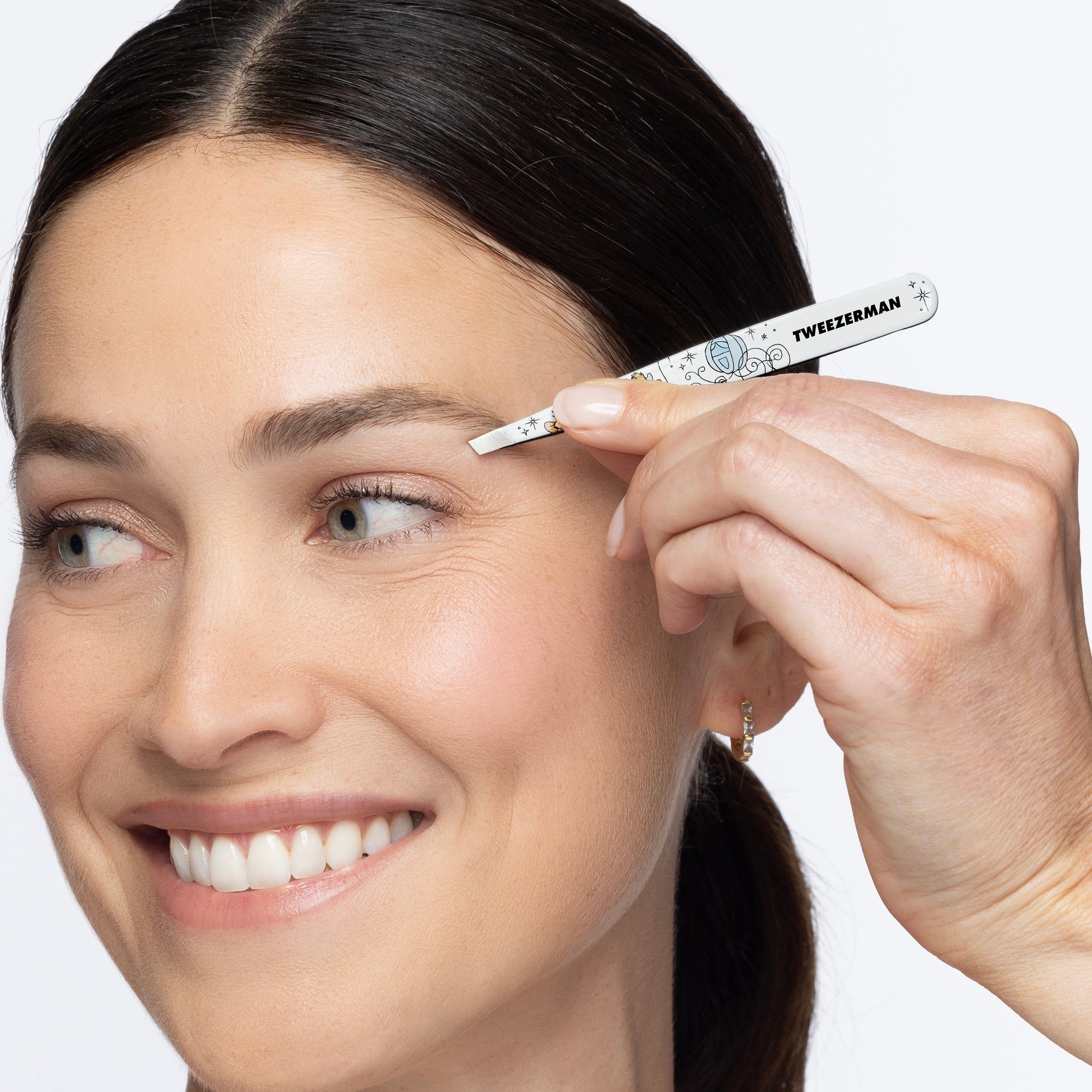 Model using Disney&#39;s Cinderella Slant Tweezer