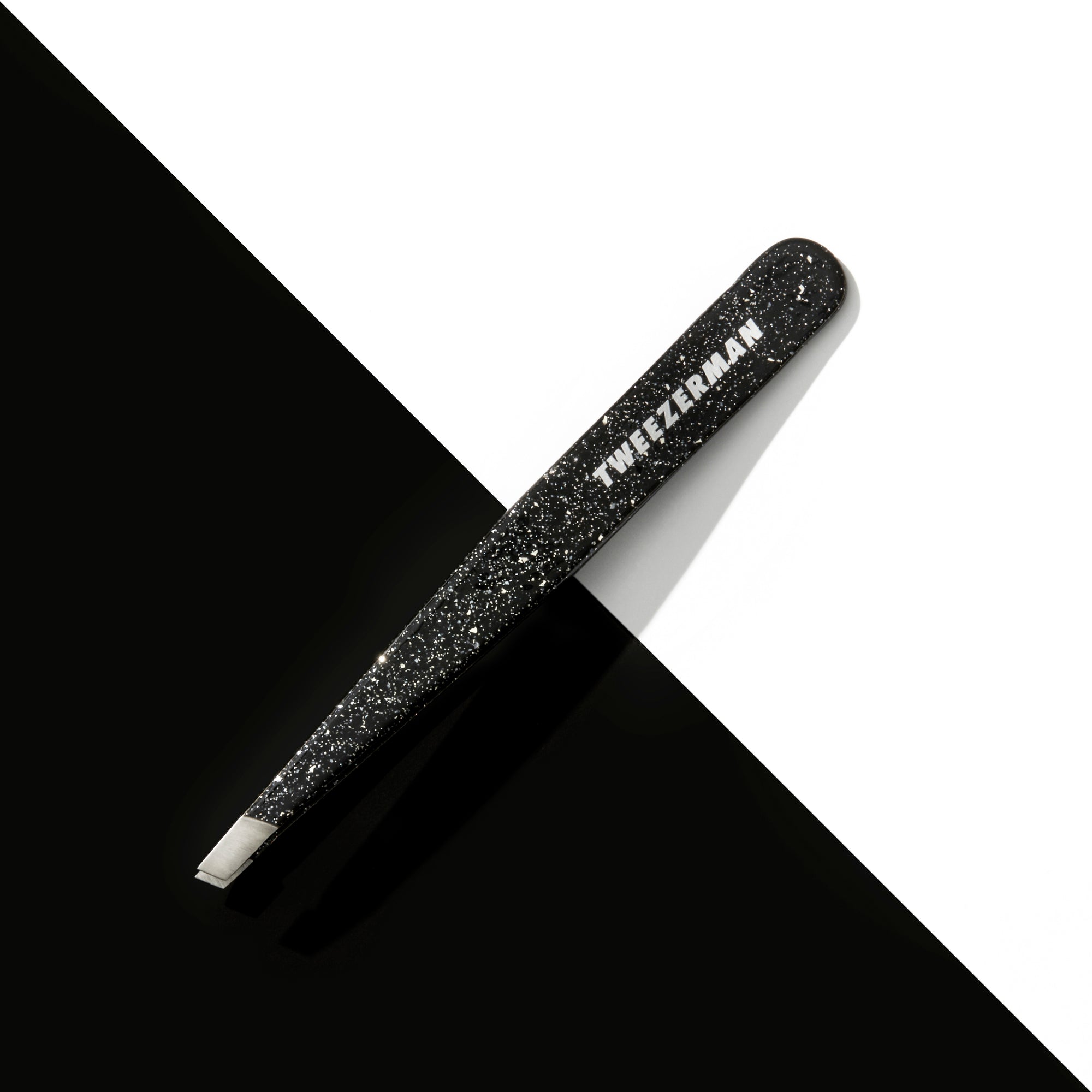 Model Using Dusted Onyx Slant Tweezer