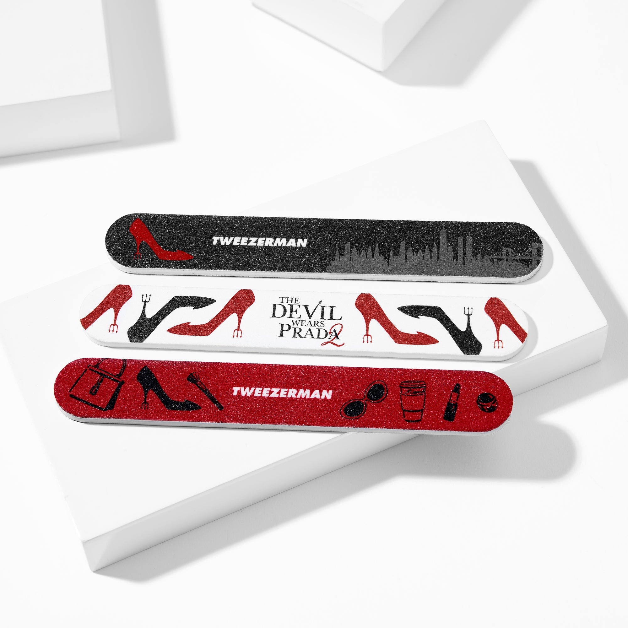 The Devil Wears Prada 2 Nail File Set placed on a white tray block