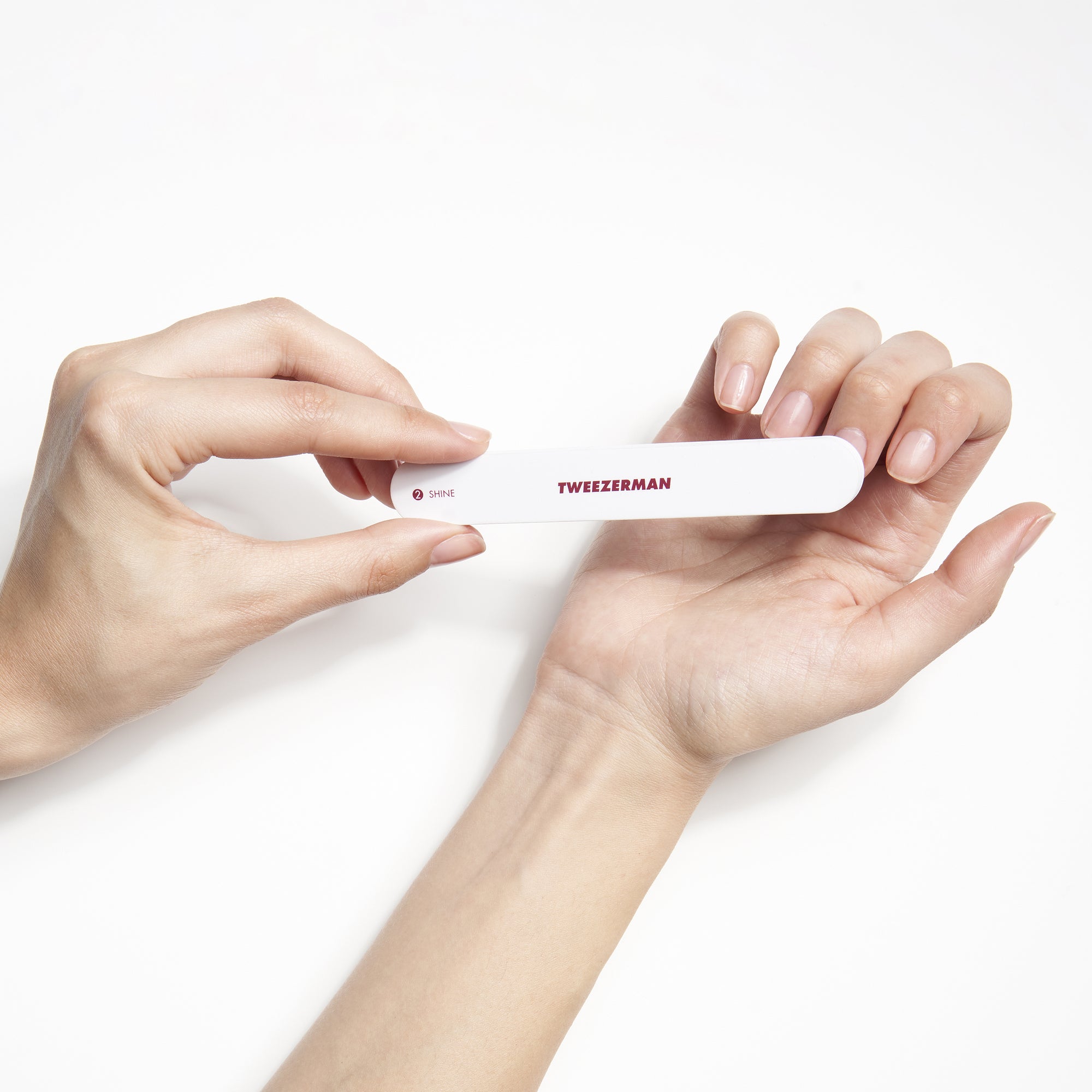 Model using Limited Edition Merry Berry nail buffer