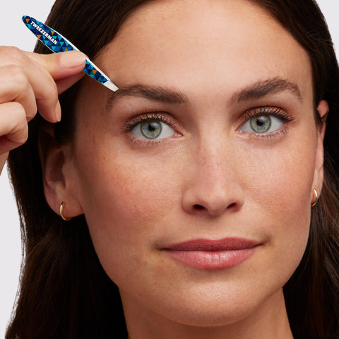 Model using Blue Mosaic Mini Slant Tweezer
