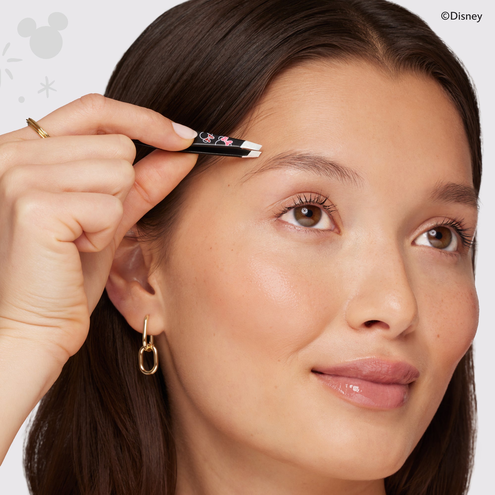 Model Using Ear-esistible Mini Slant Tweezer