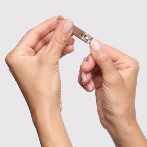 Model using Vintage Rose Fingernail Clipper