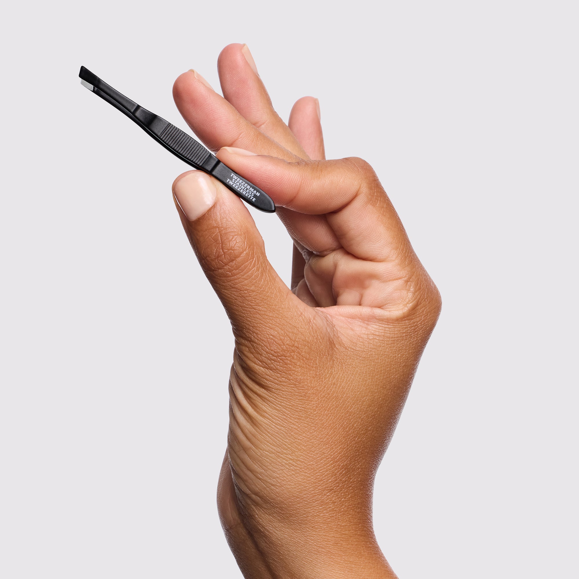 Model holding tweezerette