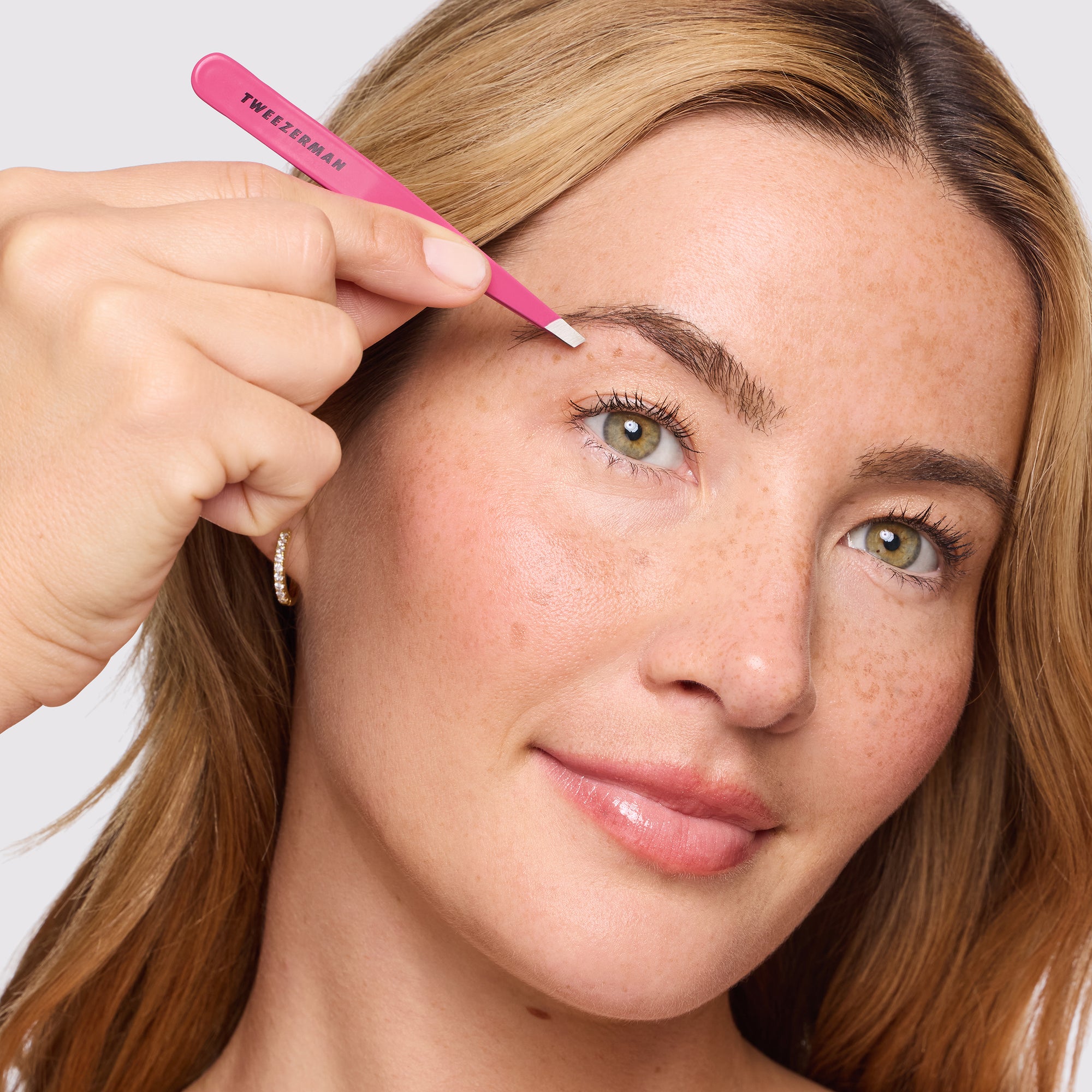 Model using Pink Slant Tweezer