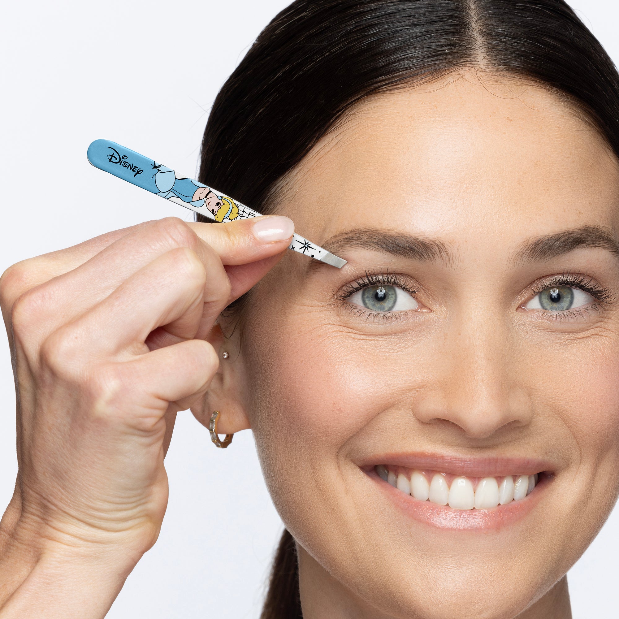 Model using Disney&#39;s Cinderella Slant Tweezer