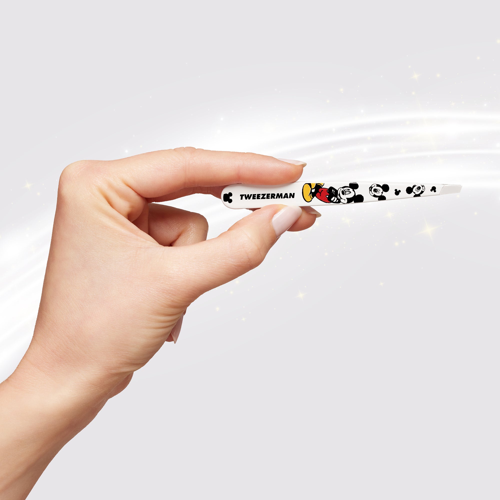 Model Holding Just Imagine Slant Tweezer