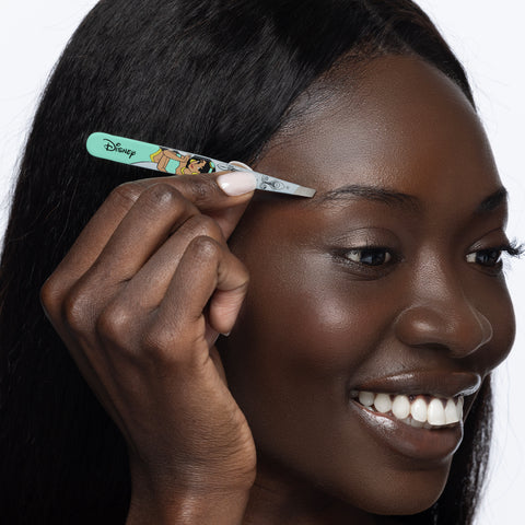 Model using Disney's Jasmine Slant Tweezer