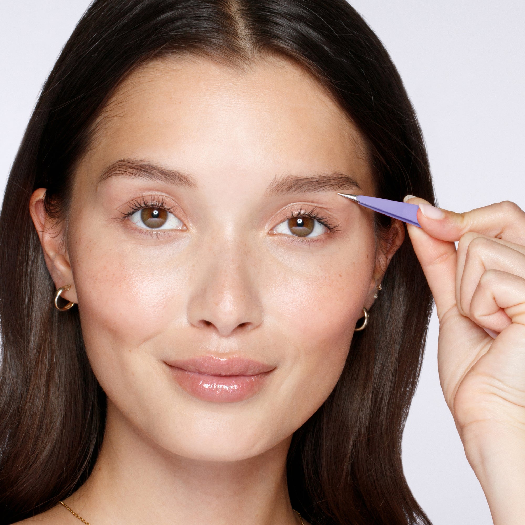 Model Using Mini Oval Purple Point Tweezer