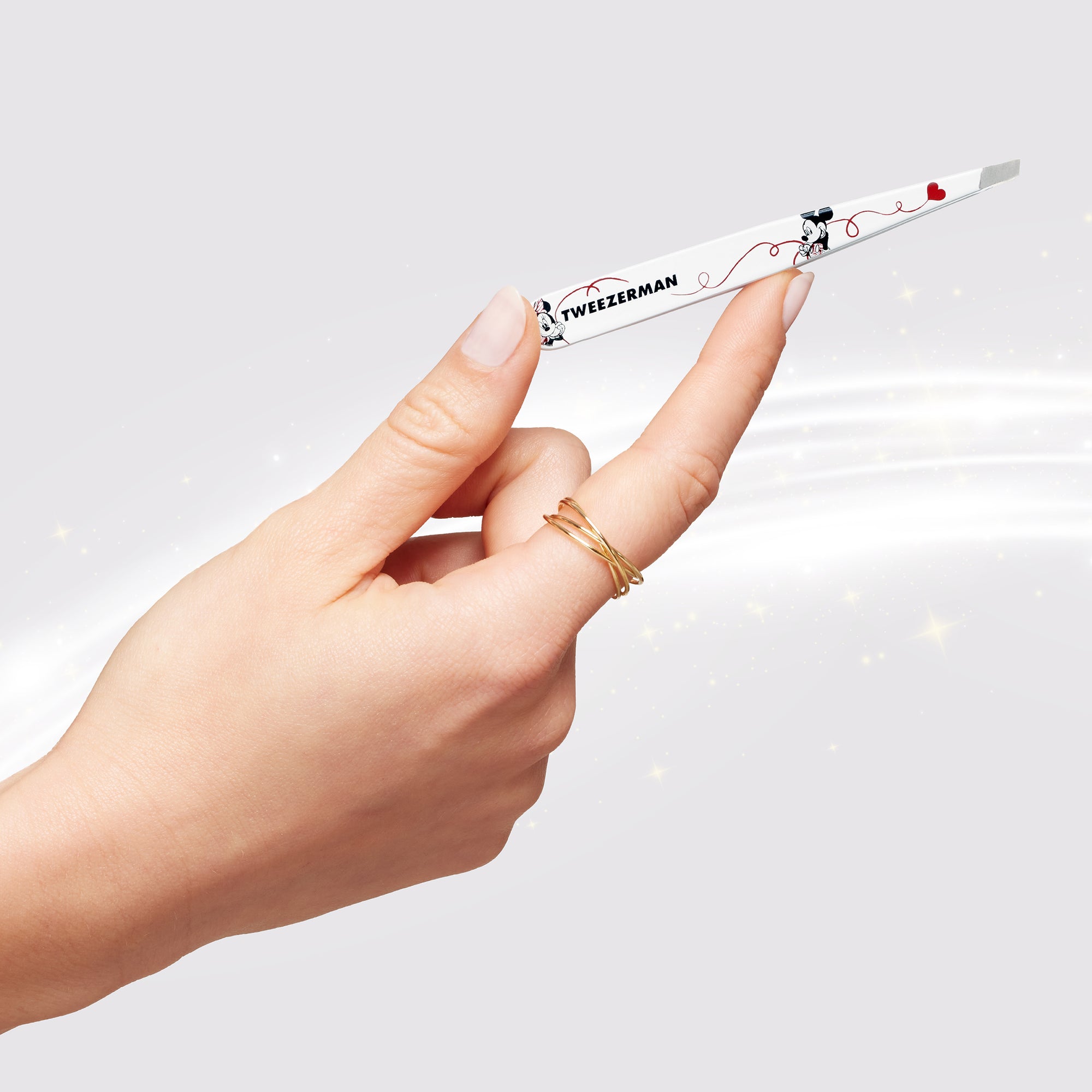 Model Holding Forever In Love Slant Tweezer