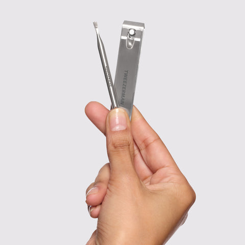 Model holding Extra Strength Nailcare Kit