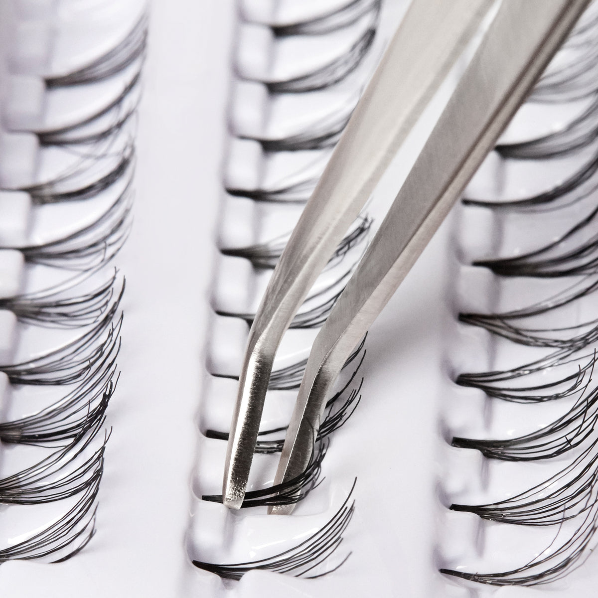 Applying individual lashes with Stainless Steel Lash Assist