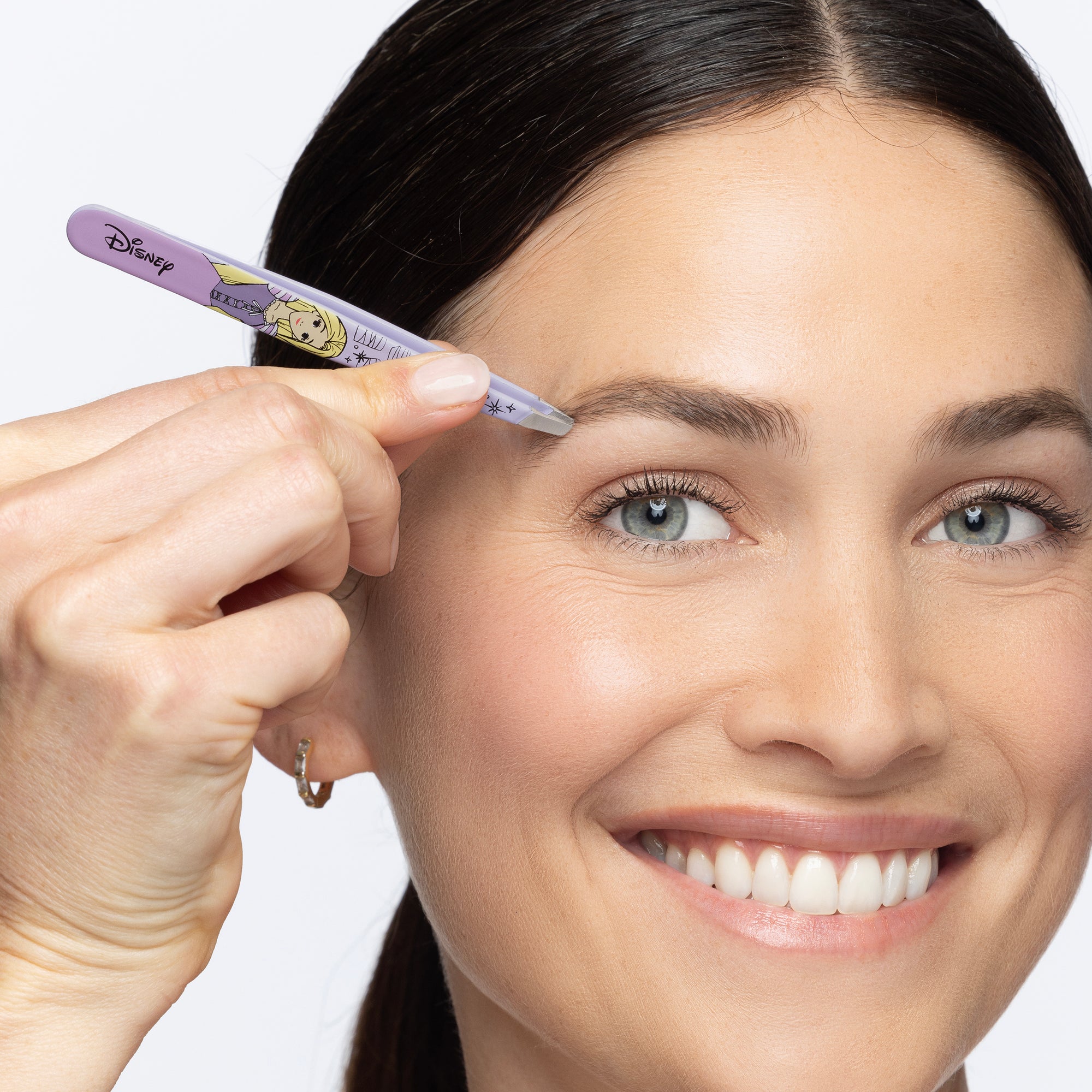 Model using Disney&#39;s Rapunzel Slant Tweezer