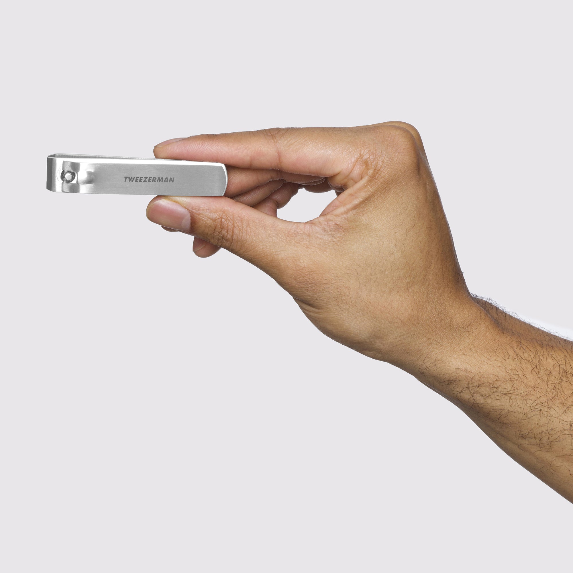 Model holding Extra Strength Toenail Clipper