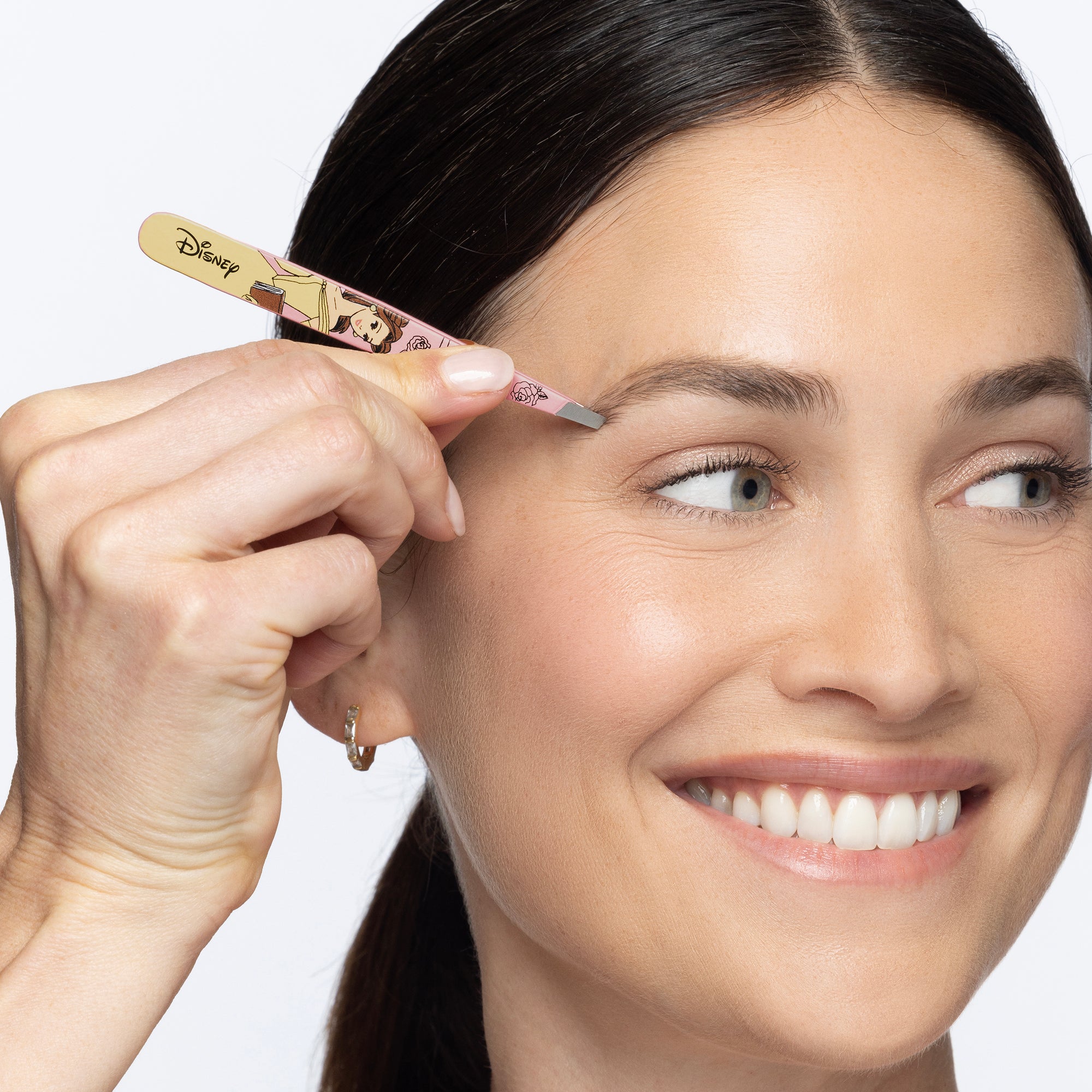 Model using Disney&#39;s Belle Slant Tweezer